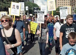 Protesters join in the 13th annual March to Abolish the Death Penalty in Austin, Texas