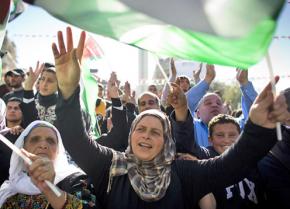 Palestinians in Ramallah celebrate the UN vote on observer status